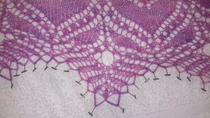 Close-up of Asterope shawl showing the attention to detail bringing out the delicate lace points