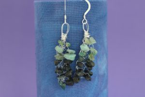 emerald_knitted_earrings_hanging_scaled